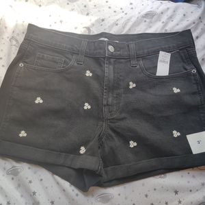 Black shorts with white flowers